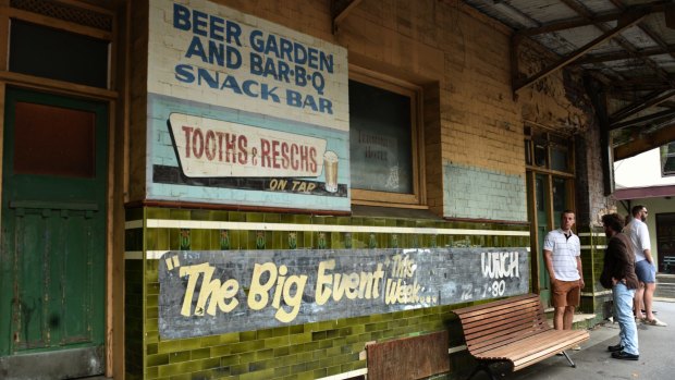 Old advertising signs still on display at the derelict Terminus Hotel.