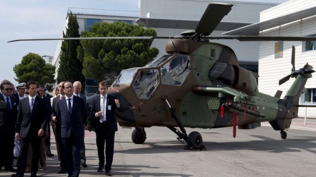 French President Francois Hollande (third right) and  Mexico's President Enrique Pena Nieto (second left) visit the Airbus Helicopters plant, in Marignane, France, on Wednesday.