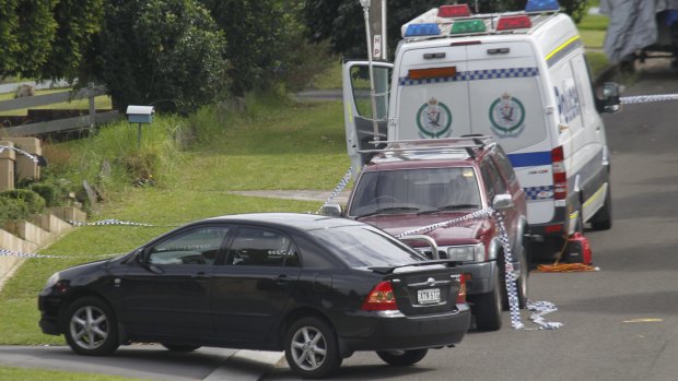 Police at the Ghalloubs' house in Winbourne Street, West Ryde in March 2012.