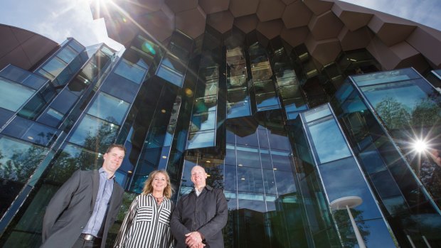 City of Greater Geelong capital projects manager Scott Cavanagh, arts and culture manager Kaz Paton and ARM Architects technical director Wayne Sanderson  in front of the new $45 million Geelong Library and Heritage Centre.