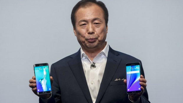 Samsung CEO J.K. Shin introduces the Galaxy S6 Edge+ (left) and Galaxy Note 5.