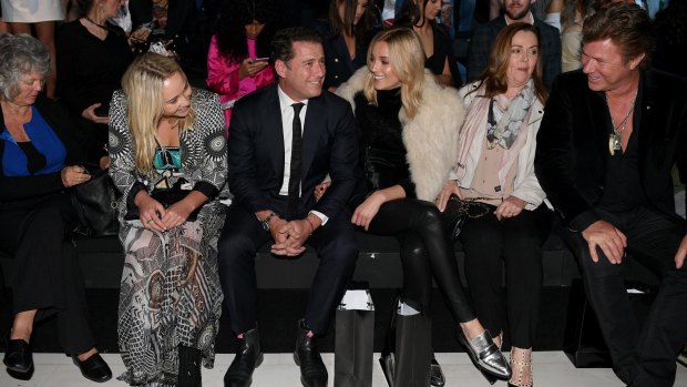 All in the family: Karl Stefanovic sitting front row during fashion week with girlfriend Jasmine Yarbrough, his mother Jenny (far left), her mother Cheryl (in pink), her sister Jade (in black and white) and Today presenter Richard Wilkins (far right).