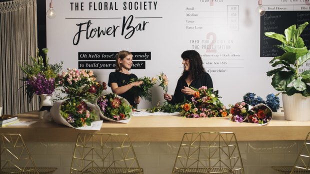 Customers are invited to take a seat at the Flower Bar and watch their floral creations be assembled in front of them.