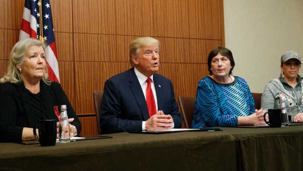 Donald Trump with (from right) Paula Jones, Kathy Shelton and Juanita Broaddrick at a press conference ahead of the second US presidential debate.