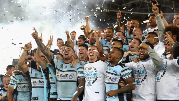 Glory daze: The Sharks celebrate their victory over Melbourne in last year's NRL grand final