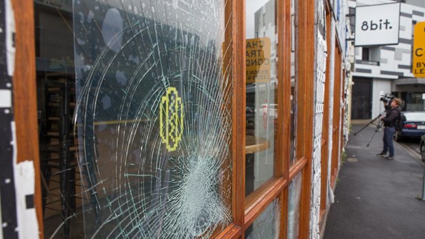 Sixteen window panels were smashed at 8-Bit over the New Year's Eve weekend. The burger restaurant has been targeted again.