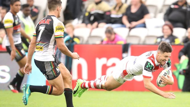 In form: Gareth Widdop scores as the Dragons shocked the Panthers in round one.