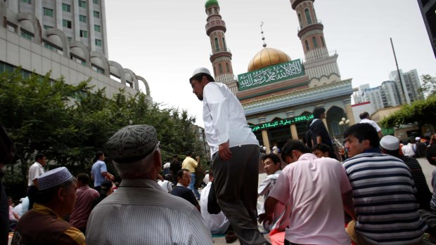 Uighur ethnic minority worshippers take part in Friday noon prayers in Urumqi, China.