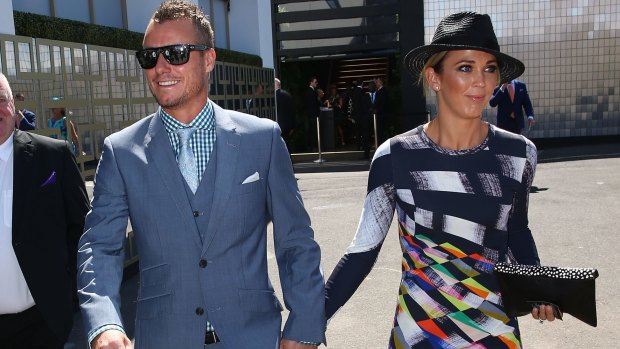 Lleyton and Bec Hewitt arrive at the Swisse marquee. 