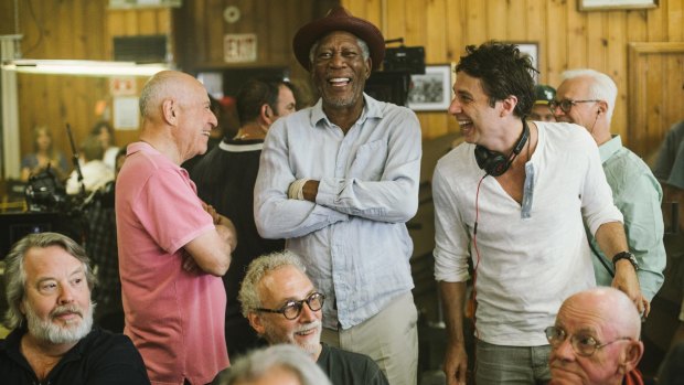 (From left) Alan Arkin and Morgan Freeman with <i>Going in Style</i> director Zach Braff on the film set. 