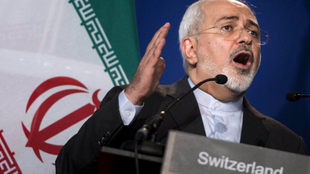 Iran's Foreign Minister Javad Zarif gestures as he speaks in Lausanne after a tentative agreement cleared the way for talks on a comprehensive settlement that should allay Western fears that Iran was seeking to build an atomic bomb and in return lift economic sanctions on the Islamic Republic.