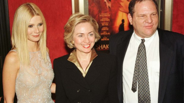Actress Gwyneth Paltrow poses with Hillary Rodham Clinton and Harvey Weinstein as they arrive for the premiere of Shakespeare in Love in 1999.