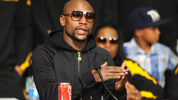 THAT'S GOLD: Floyd Mayweather Jr will square off against arch rival Manny Pacquiao in Las Vegas on May 2. 