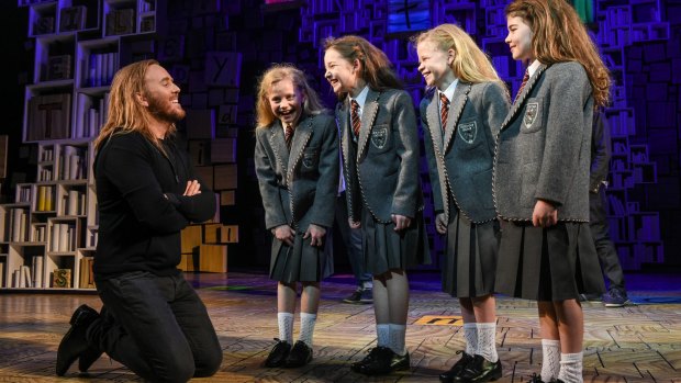 Tim Minchin with the four Sydney Matildas (from left) Georgia Taplin, Bella Thomas, Sasha Rose and Molly Barwick. 