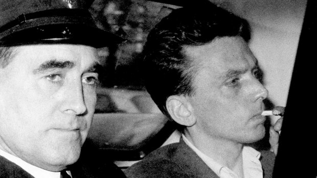 October 1965: Ian Brady, right, arrives at court in Cheshire to be convicted of multiple child murders. He later confessed to further murders.