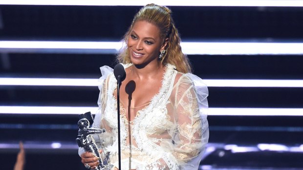 Queen of the night ... Beyonce accepts the award for Video of the Year for Lemonade.