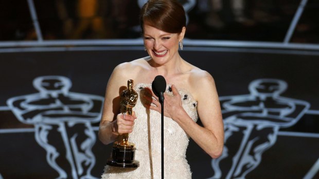Julianne Moore accepts the Oscar for Best Actress for her role in <i>Still Alice</i> in 2015.