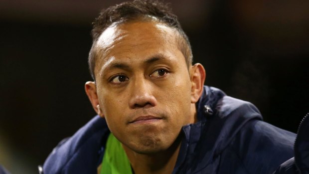 Christian Lealiifano watches on from the bench against the Hurricanes.
