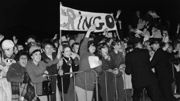 Fans await the arrival of Ringo Starr of the Beatles at Kingsford Smith Airport,Sydney, in June 1964.
