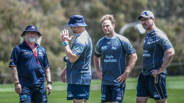 Peter Ryan, centre, with the Brumbies coaching staff.