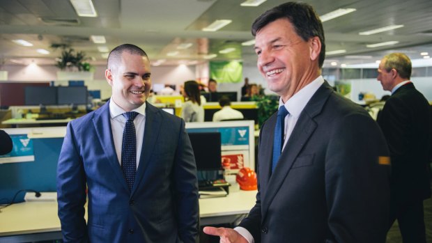 Assistant Minister for Cities and Digital Transformation, Angus Taylor, pictured with Veritec CEO Keiran Mott, pushed through reforms to the government's IT agenda.