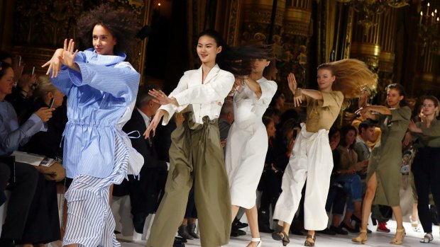 Models dance during the presentation of Stella McCartney's SS17 collection on Monday.
