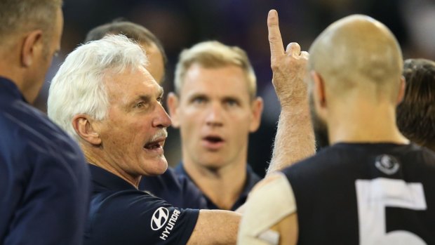 The only way is up... Blues coach Mick Malthouse speaks to his players during Friday's game.