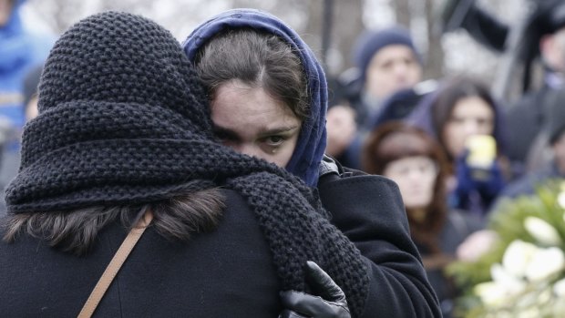 Zhanna, a daughter of murdered Russian opposition figure Boris Nemtsov, farewells her father in Moscow. 