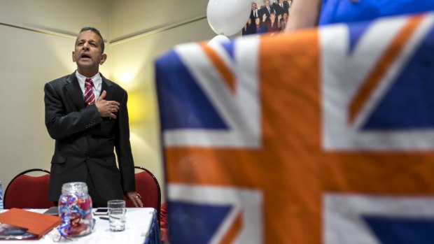 Danny Nalliah sings the Australian National Anthem at an event for the Rise Up Australia party. 