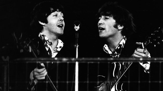 Paul McCartney and John Lennon during the last Beatles concert at Candlestick Park on August 29, 1966. 