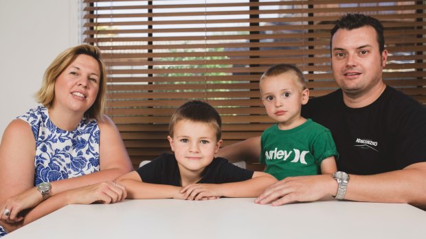 Alyssa Krause and Bryce Wishart, with their children Jude and Luca. 