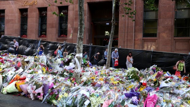 Aftermath: A floral tribute in Martin Place for victims of the Lindt Cafe seige. 