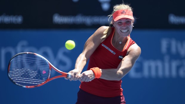 Feeling the heat: Germany's Angelique Kerber defied the conditions in Sydney to win her first-round match against Elina Svitolina.