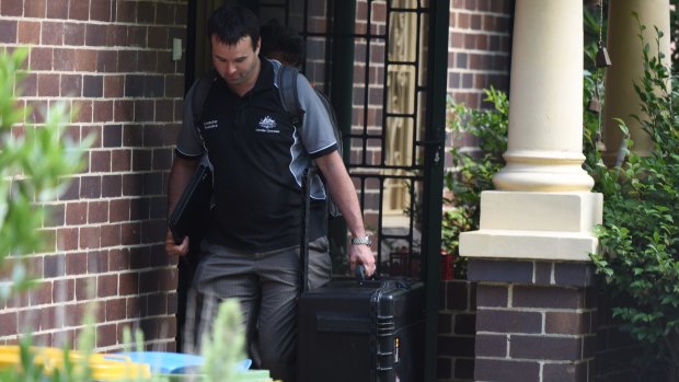 The AFP and tax investigators raid Craig Wright's home in Gordon. 