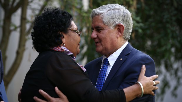 June Oscar is embraced by Minister for Indigenous Health Ken Wyatt.