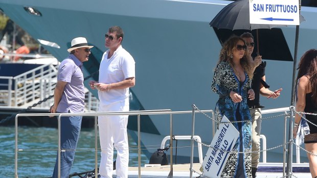 Mariah Carey, James Packer and Kerry Stokes in Portofino on June 26, 2015.
