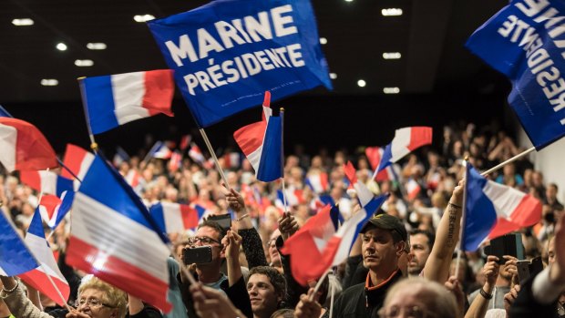 Supporters cheer candidate for the presidential election Marine Le Pen during a campaign meeting in Monswiller, near Strasbourg, earlier this month.