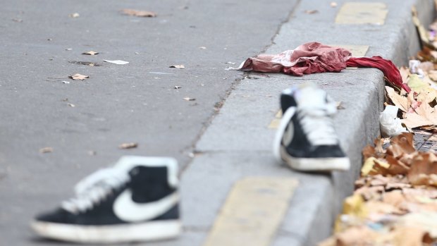 The scene outside the Bataclan theatre the morning after terrorists shot over 100 people in Paris 