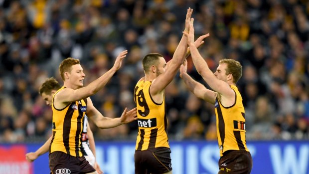 Happy Hawks: Jack Gunston puts the finishing touch on Hawthorn's win over Collingwood.