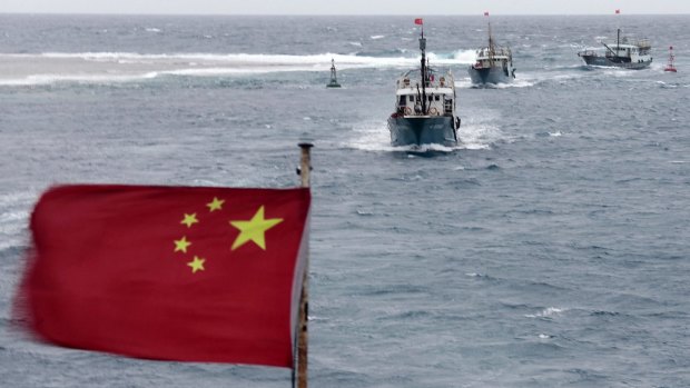 Chinese fishing boats sail in the South China Sea.