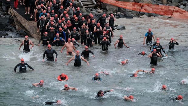 They're off: Lorne Pier to Pub competitors take to the water.