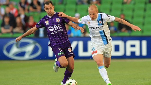 Richard Garcia competes with Aaron Mooy. Both players found the net in an exciting draw.