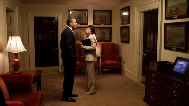 Former US president Barack Obama chats with his then senior advisor Valerie Jarrett outside the Oval Office in the White House, June 12, 2009. 