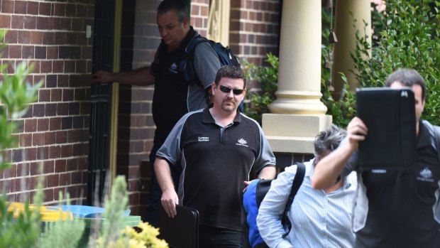 The AFP and tax investigators raid Craig Wright's home in Gordon. 