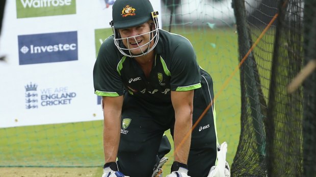 Shane Watson recovers after being hit while batting during a nets session in Cardiff.