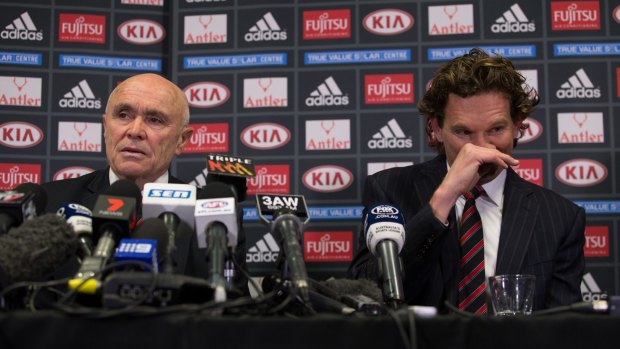 James Hird and Paul Little make the announcement.