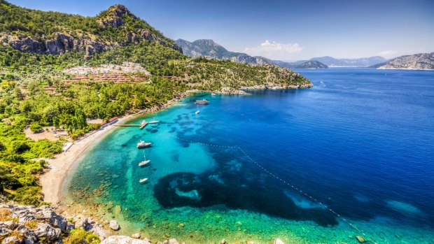 The Turkish island of Marmaris (pictured) can be a bargain but beware the high-season hordes of northern Europeans.