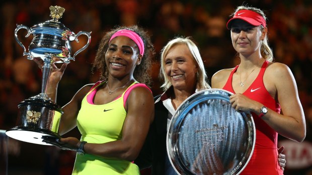 Martina Navratilova (centre) poses with Serena Williams and Maria Sharapova after the women's final.