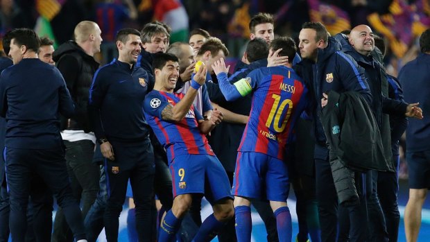 Jubilation on the pitch as Barcelona celebrate their victory.