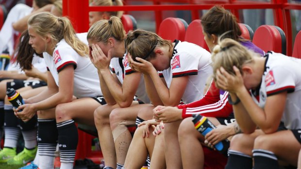 Disappointed: German players react to their loss in the third-place playoff.